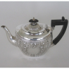 Late Victorian Bachelor Silver Teapot Embossed with Fluting Flowers and Scrolls
