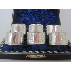 Set of Six Round Silver Plated Napkin Rings in Blue Silk Lined Box