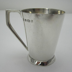 Silver Child's Mug with Angled Handle and Plain Conical Body (1933)