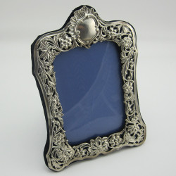 Shaped Silver Photo Frame with Empty Cartouche Floral and Foliage Embossed Pierced Border