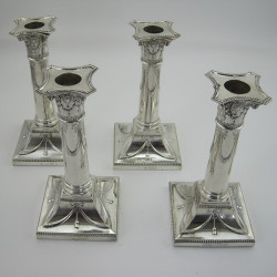 Set of four Thomas Bradbury Sterling Silver Candle Sticks (1896 and 1900)