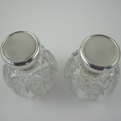 Decorative Pair of Cut Glass and Silver Topped Perfume Bottles