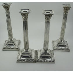 Impressive Set of Four George II Style Victorian Sterling Silver Candlesticks