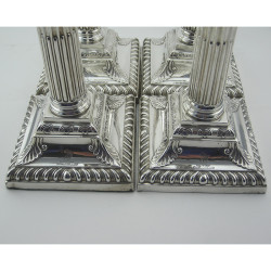 Impressive Set of Four George II Style Victorian Sterling Silver Candlesticks