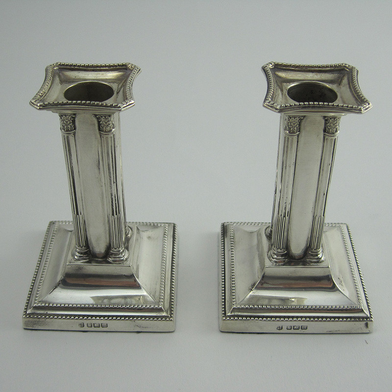Pair of Dwarf Style Sterling Silver Candle Sticks with Fixed Nozzles (1904).