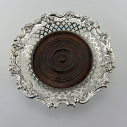 Decorative Pair of Victorian Silver Plated Bottle Coasters with Floral and Scroll Borders