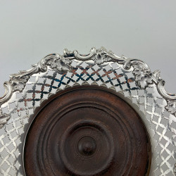 Decorative Pair of Victorian Silver Plated Bottle Coasters with Floral and Scroll Borders
