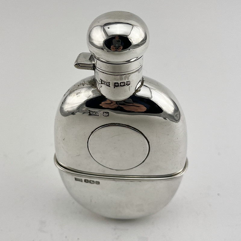 Walker & Hall Sterling Silver Hip Flask with Oval Shaped Body (1921) Walker & Hall Sterling Silver Hip Flask with Oval Shaped Body (1921)