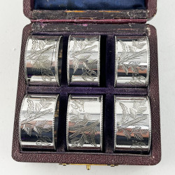 Boxed Set of Six Aesthetic Movement Engraved Silver Plated Napkin Rings