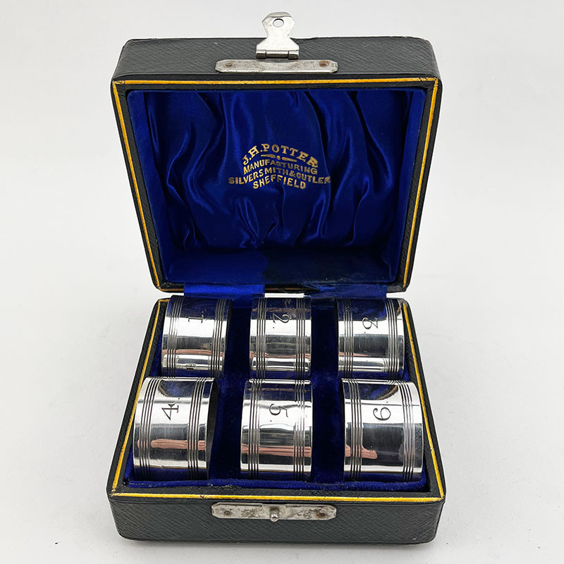 Set of Six Boxed Silver Plated Napkin Rings (c.1900)