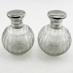 Pair of Stylish Sterling Silver and Glass Perfume Bottles (1924)