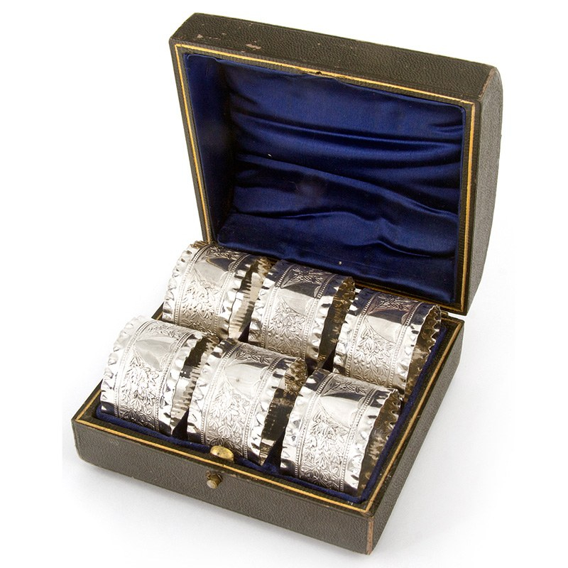 Six Antique Silver Plated Napkin Rings with a Shield Design