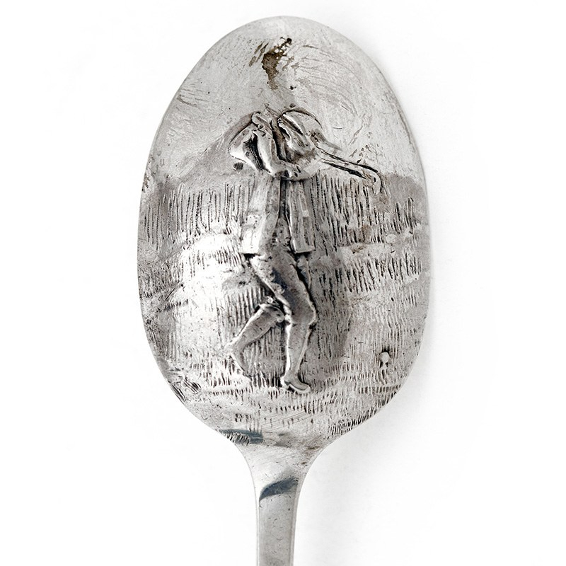 Plain Silver Tea Spoon with a Golfing Scene on the Reverse