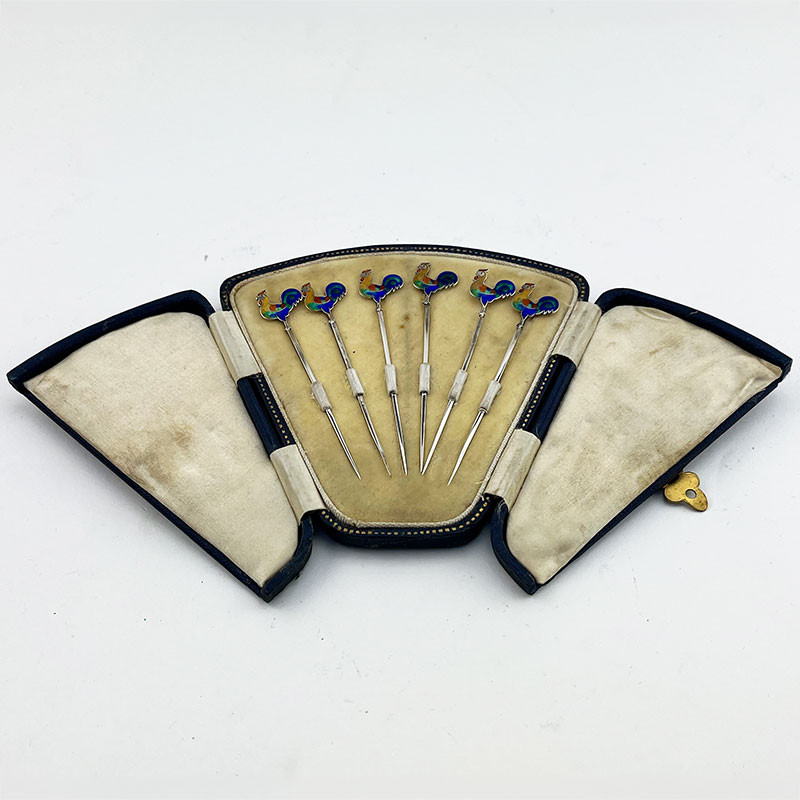Boxed Set of Six Sterling Silver and Enamel Cocktail Picks (1928)