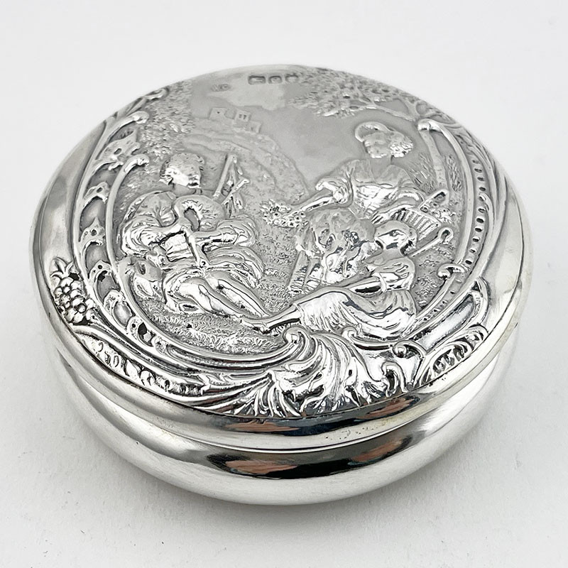 Victorian Sterling Silver Trinket Box Featuring Females and a Man Playing the Bag Pipes (1900)