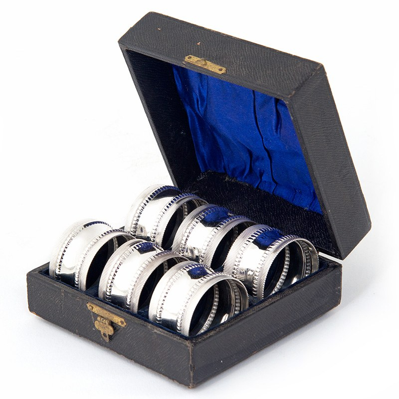 Set of Six Silver Plate Napkin Rings in Original Blue Silk Lined Box