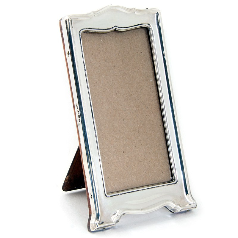 Slim Rectangular Plain Antique Silver Frame with a Shaped Top and Base