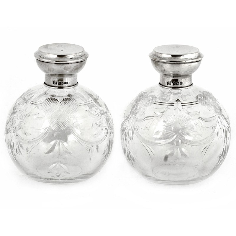 Pair of Cut Glass Silver Topped Perfume Bottles