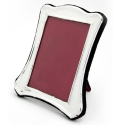 Edwardian Silver Picture Frame with a Plain Shaped and Curved Border