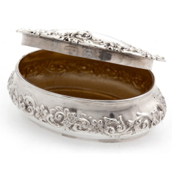 Oval Silver Trinket Box with Hinged Lid and Decorated with Scrolls and Flowers