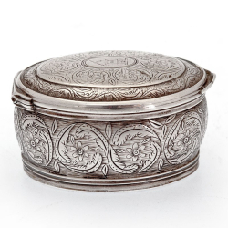 Oval Continental Silver Snuff Box Decorated with Floral Scenes and Gilt Interior