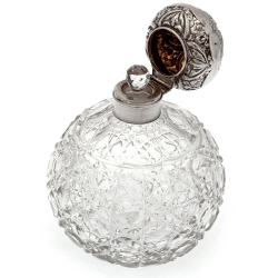 Pair of Large Globe Shaped Silver Top Perfume Bottles with Hob Cut Glass Bodies