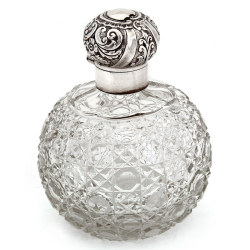 Large Victorian Silver Top Perfume Bottle with a Hob Cut Glass Globe Shaped Body