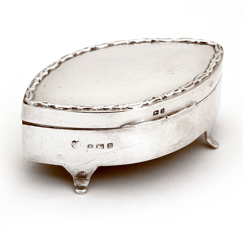Edwardian Oval Silver Jewellery Box with a Hinged Lid and Applied Cast Border