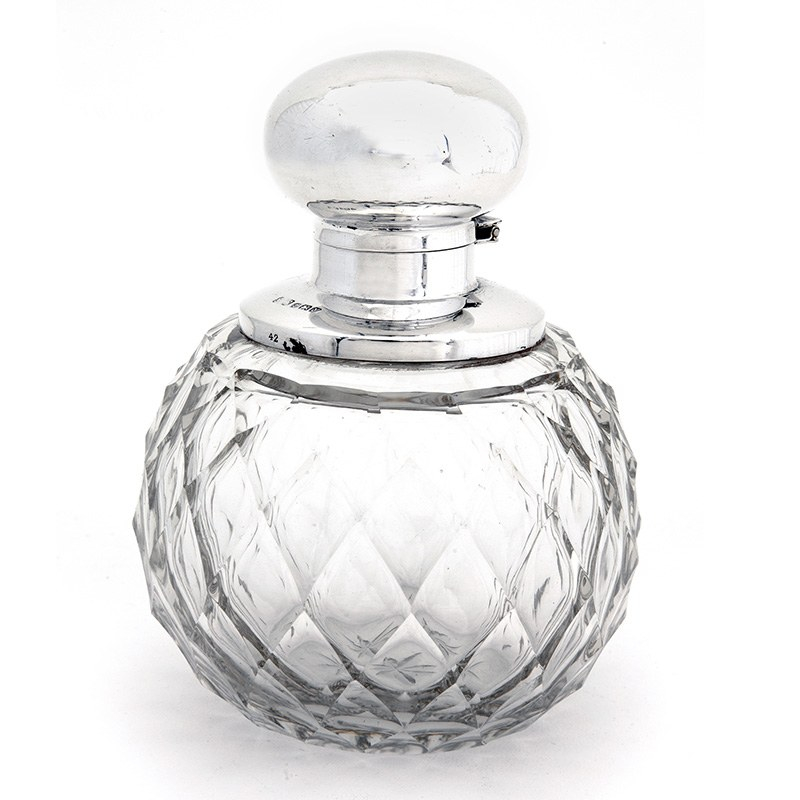 Globe Shape Silver Perfume Bottle with a Plain Hinged Bun Shaped Lid and Plain Silver Cape