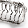 Victorian Silver Plated Seven Shaped Hoop Section Toast Rack with a Cast Scroll Handle