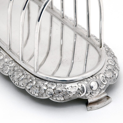 Victorian Silver Plated Toast Rack with Seven Hoops and Repousse Decoration of Flowers on the Base