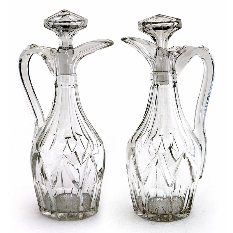 Pair of Victorian Cut Glass Claret Jugs with Deep Cut Bodies and Applied Scroll Handles