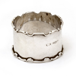 Boxed Set of Six Silver Napkin Rings with Plain Bodies and Chippendale Style Borders