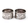 Pair of Arts and Crafts Style Silver Napkin Rings Chased with Stylised Foliage