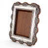 Edwardian Bevelled Glass Silver Photo Frame with a Pierced Scrolling Floral Border