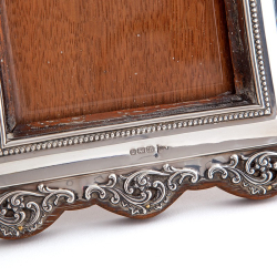 Edwardian Bevelled Glass Silver Photo Frame with a Pierced Scrolling Floral Border