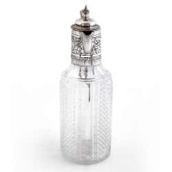 Victorian Silver Claret Jug with a Hinged Domed Cover and an Unusual Crimped Scroll Handle