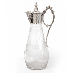 Antique Silver Plated Claret Jug with a Cast Floral Spout and Hand Engraved Glass Body