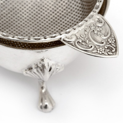 Vintage Tea Strainer with a Cast Floral Handle and Matching Drip Bowl