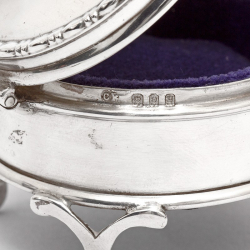 Small Circular Silver Jewellery Box with a Plain Body and Mauve Velvet Lining