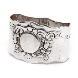 Edwardian Oval Silver Napkin Ring Embossed with Scrolls and Flowers