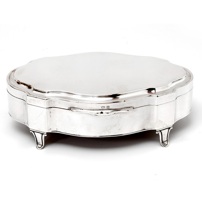 Antique Silver Trinket Box in an Oval Shaped Form with a Plain Hinged Lid