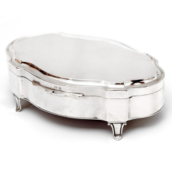 Antique Silver Trinket Box in an Oval Shaped Form with a Plain Hinged Lid