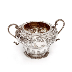 Late Victorian Three Piece Silver Tea Set Chased with Flowers and Scrolls