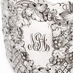 Victorian Silver Christening Mug with a Grape and Vine Pattern and Scroll Handle