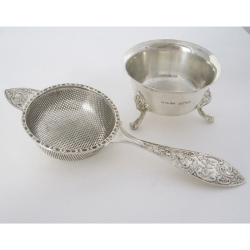 Good Quality Silver Tea Strainer with a Decorative Cast Scroll and Floral Handle