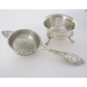 Good Quality Silver Tea Strainer with a Decorative Cast Scroll and Floral Handle