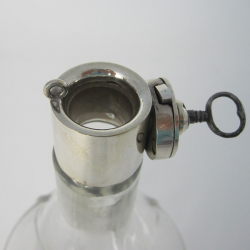 John Grinsell & Son Locking Decanter with a Silver Plated Locking Mount