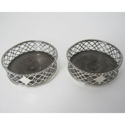 Pair of George III Silver Coasters with Gadroon Borders and Pierced Fretwork Sides