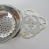 Silver Tea Strainer and Bowl with Keyhole Style Pierced Tab Handles